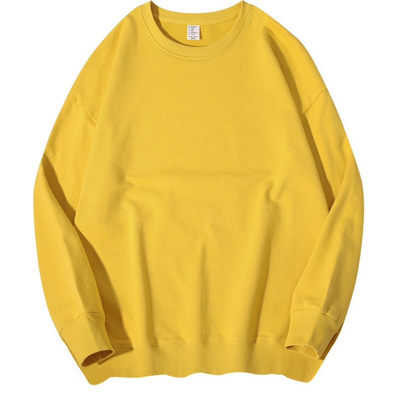 Yellow oversized crewneck sweatshirt, front view flat lay