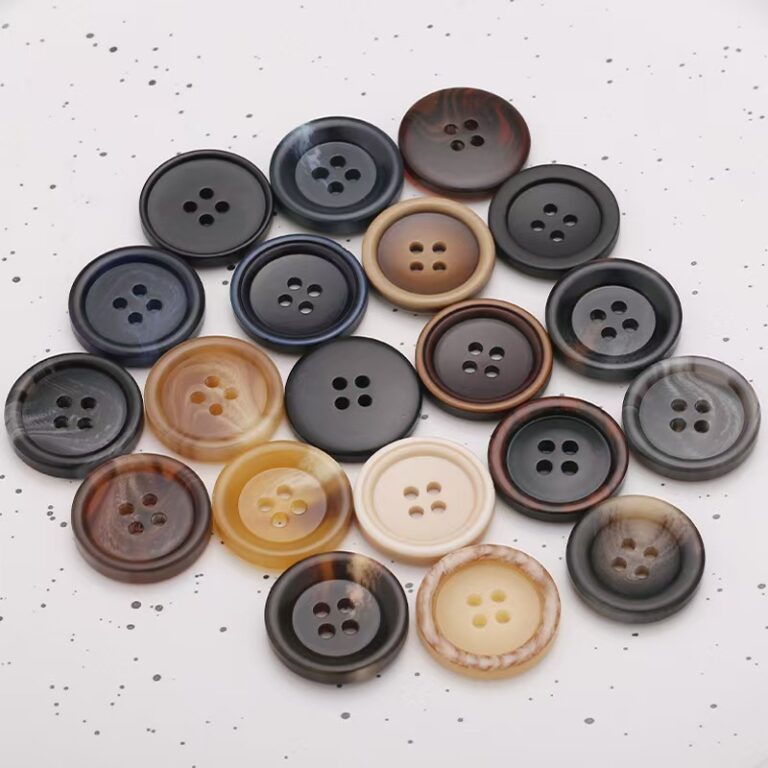 Patterned resin round four-hole button