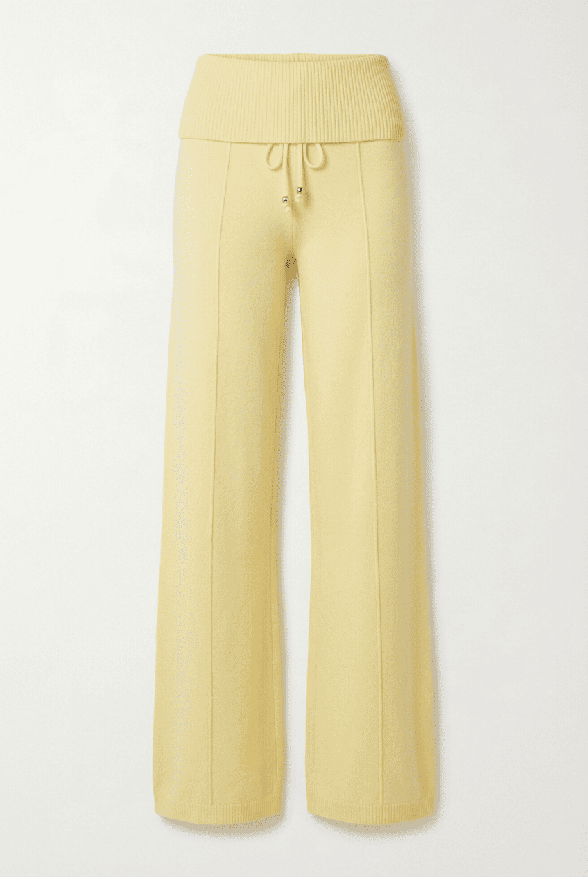Butter yellow knit wide-leg trousers with ribbed high waistband and drawstring closure, front view flat lay