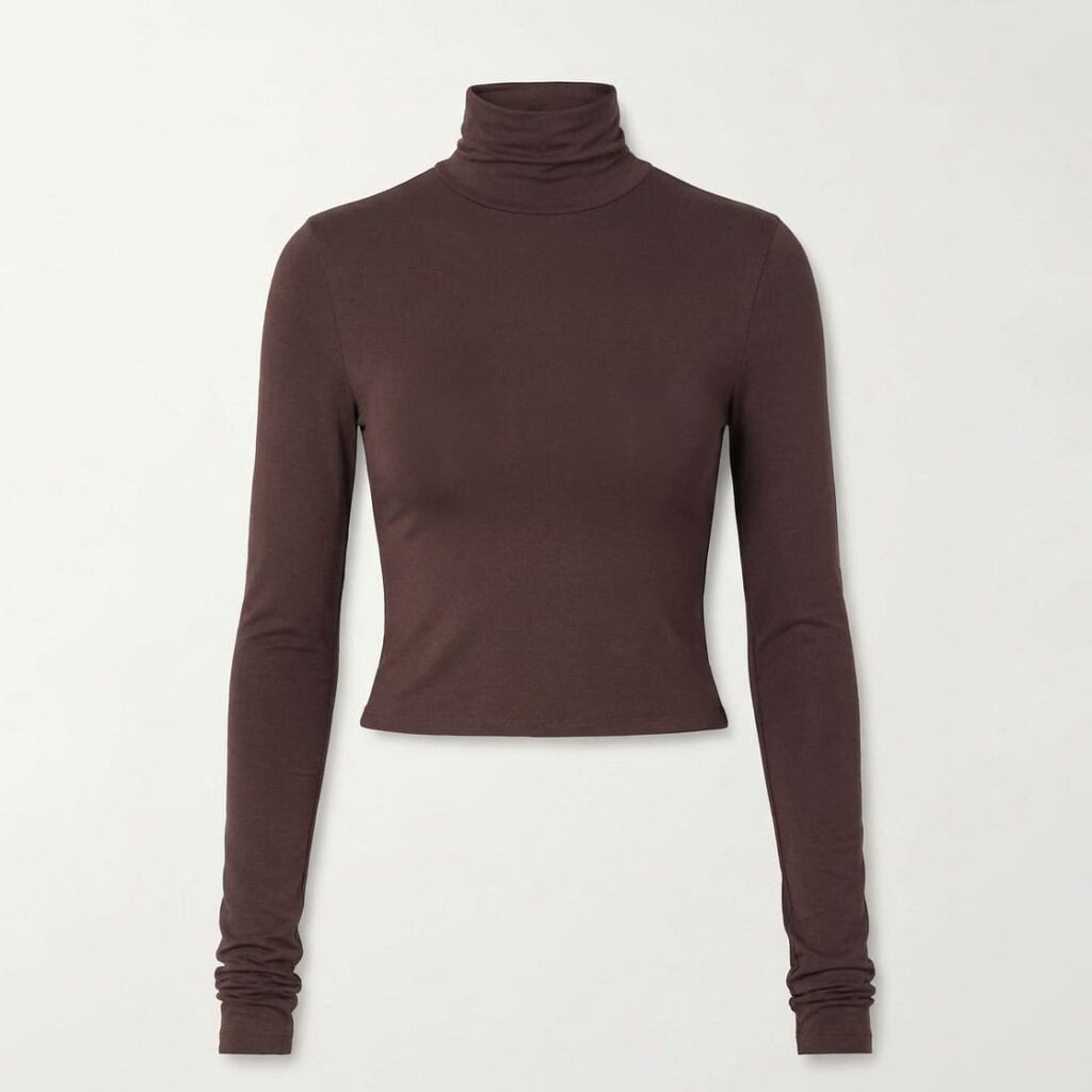 Chocolate brown slim-fit cropped turtleneck top, front view flat lay with ruched cuffs