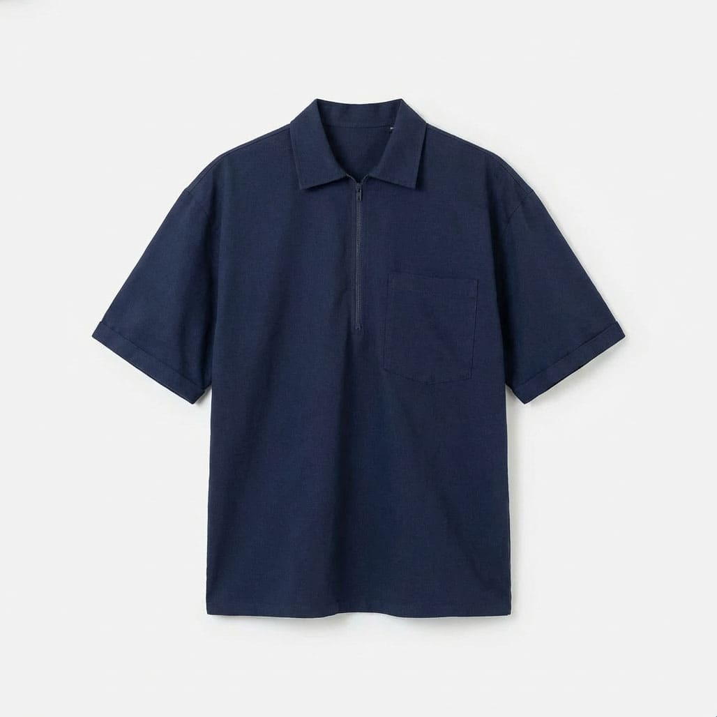 Navy blue half-zip short-sleeve polo shirt with chest pocket, front view flat lay