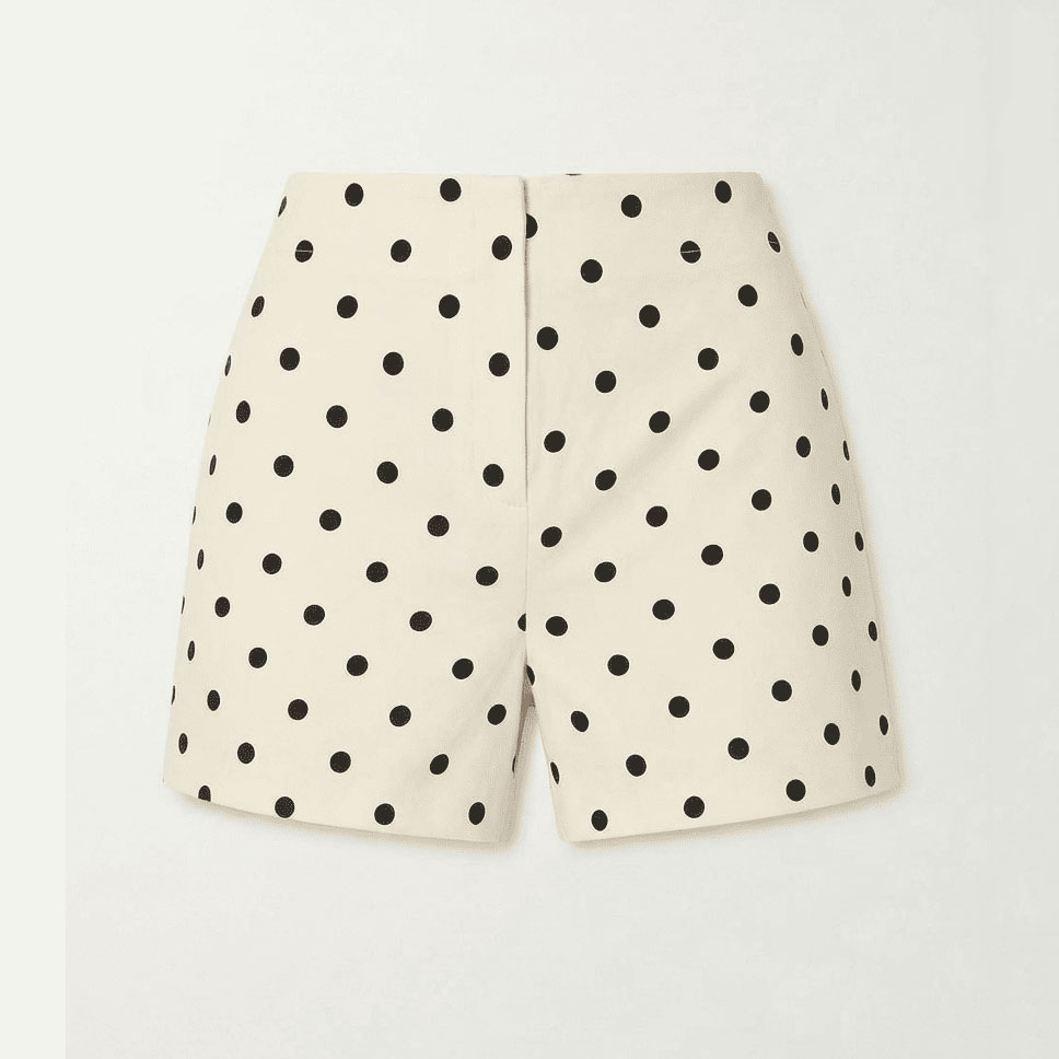 Ivory high-waisted shorts with black polka dot print, front view flat lay