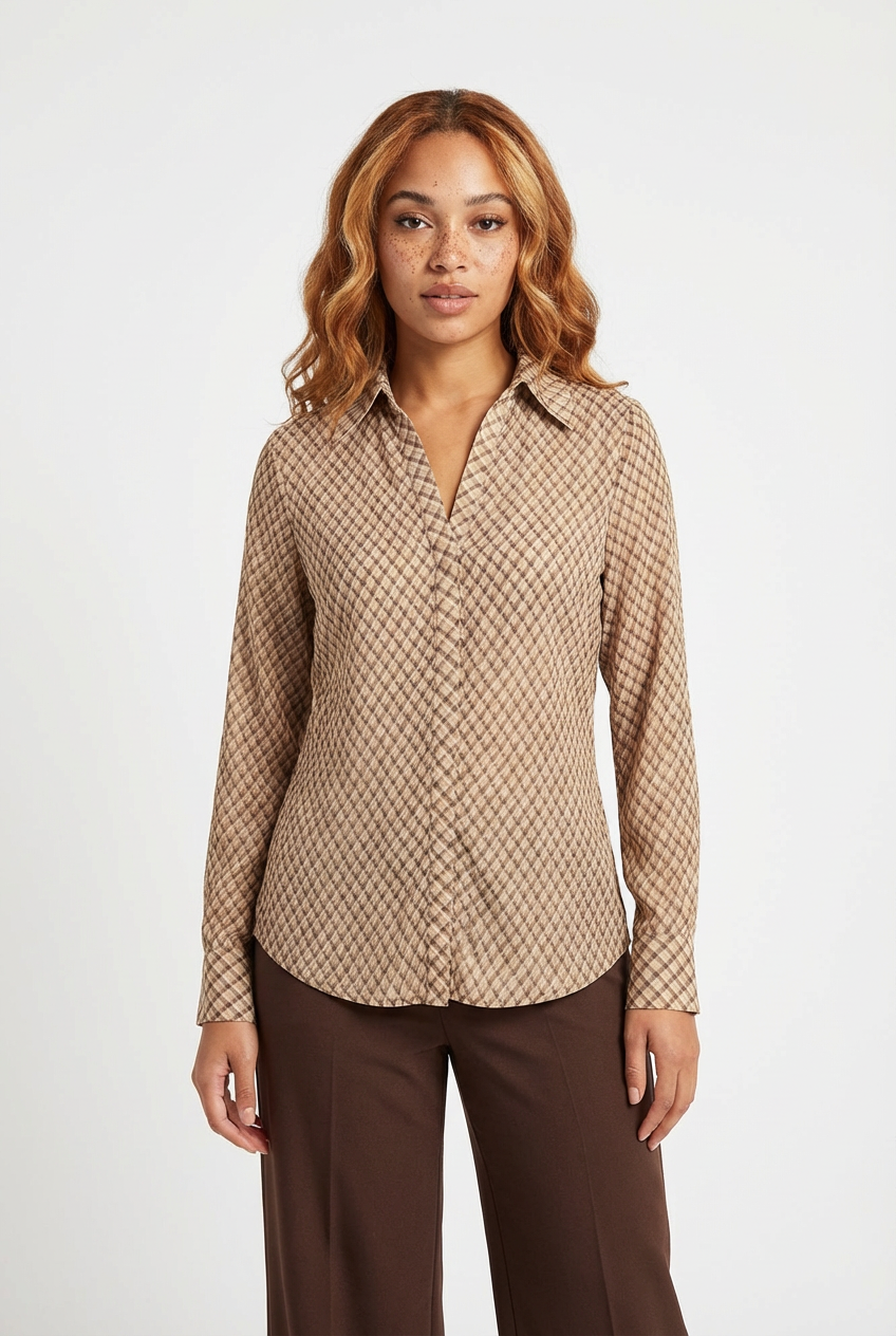 Model wearing tan diamond-check print collared shirt, front view styled with dark brown wide-leg trousers