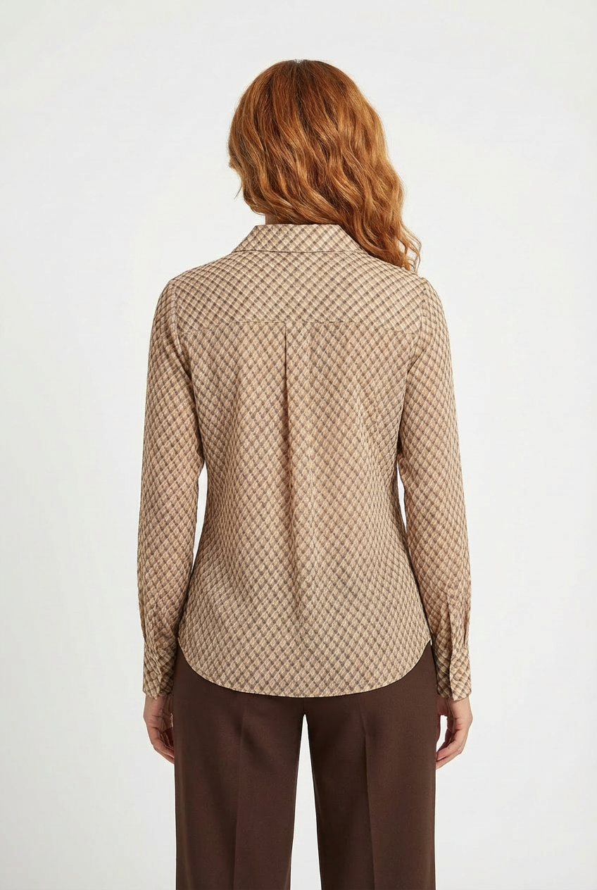 Model wearing tan diamond-check print collared shirt, back view showing curved hem and back yoke detail, paired with dark brown wide-leg trousers