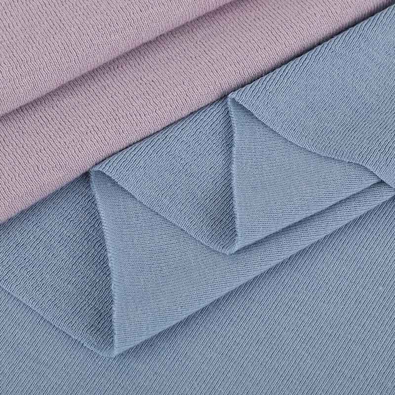 soft stretch knit fabric edge detail for base layer apparel