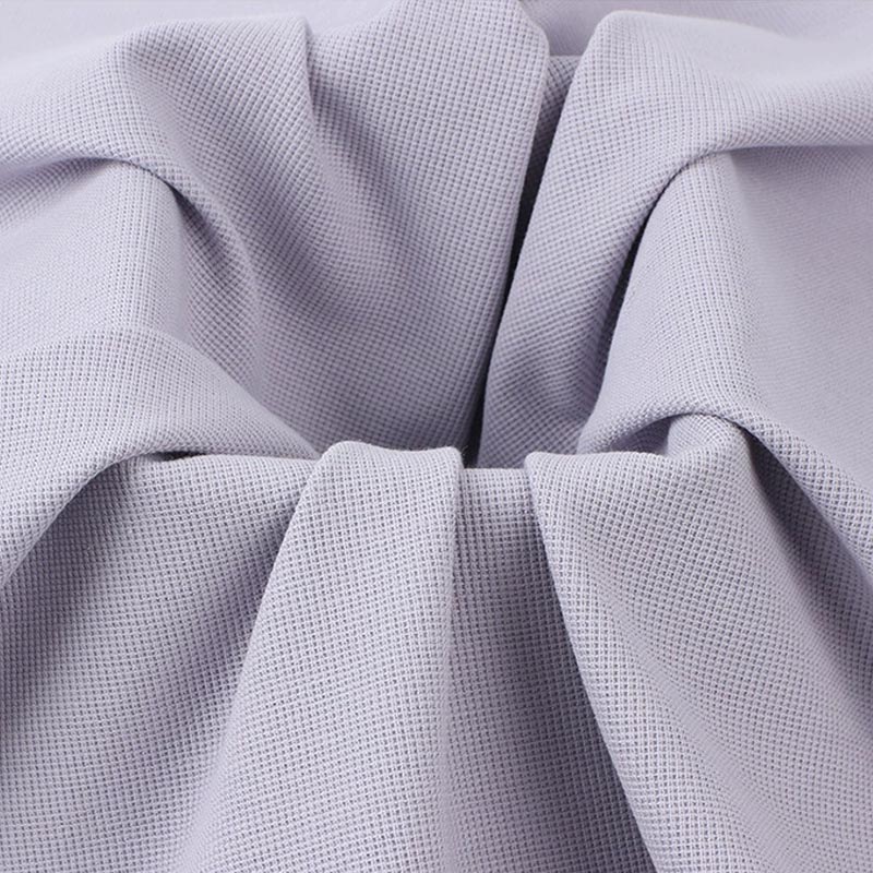 textured waffle knit fabric drape showing soft structure