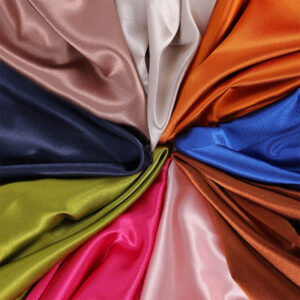Crystal satin fabric in multiple colors with glossy smooth finish