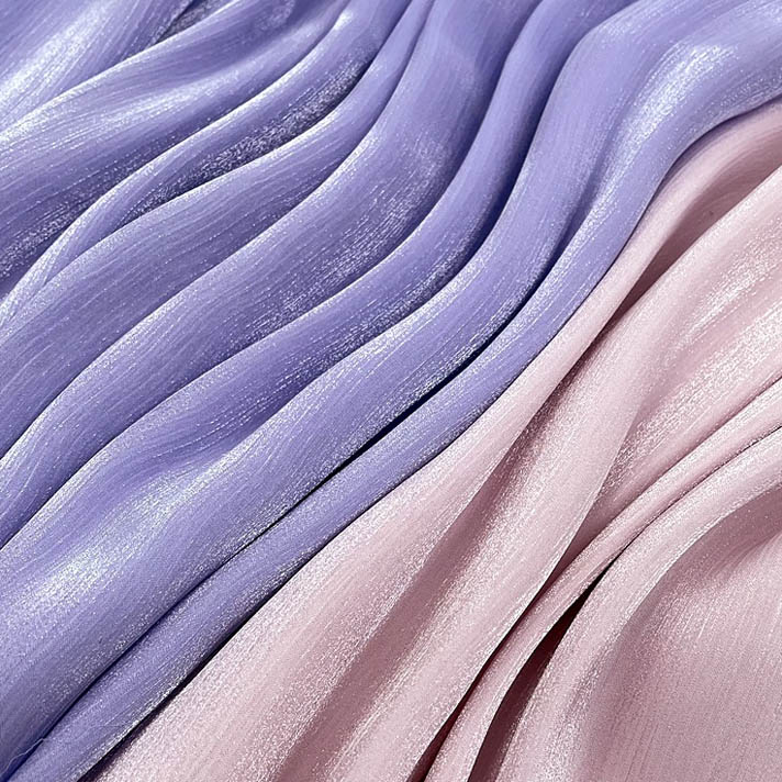 Lavender and pink satin fabric with glossy shimmering finish
