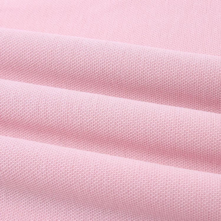 Close-up of 220G pique knit fabric showing breathable honeycomb texture