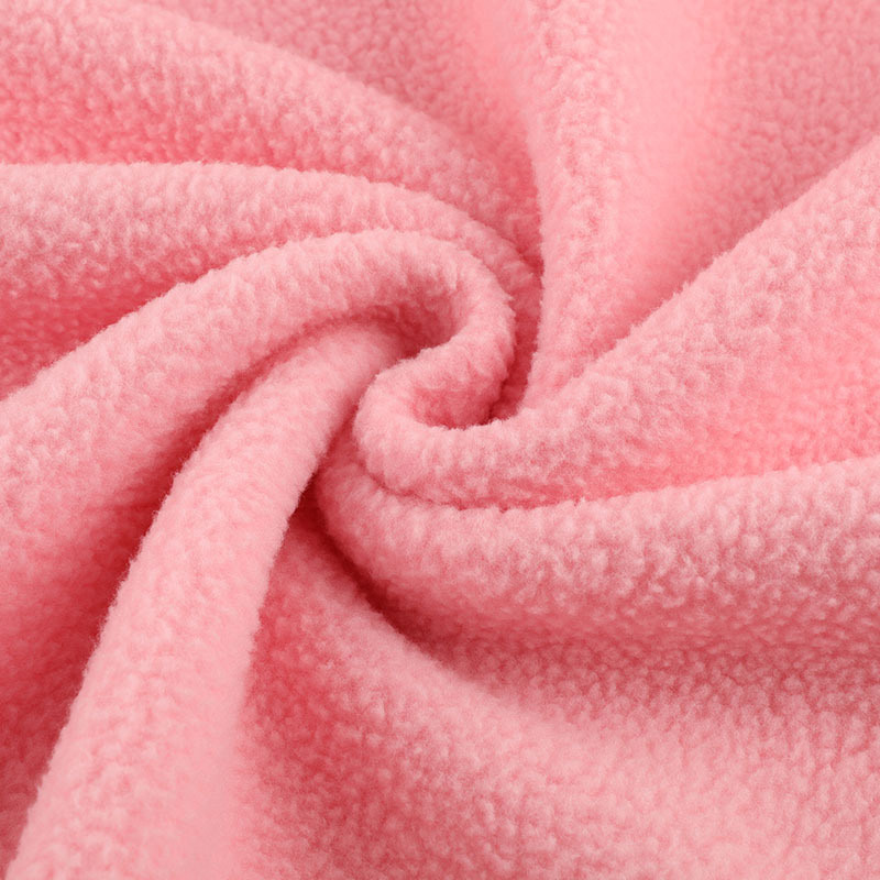 Sherpa fleece fabric showing softness and drape in swirl shape