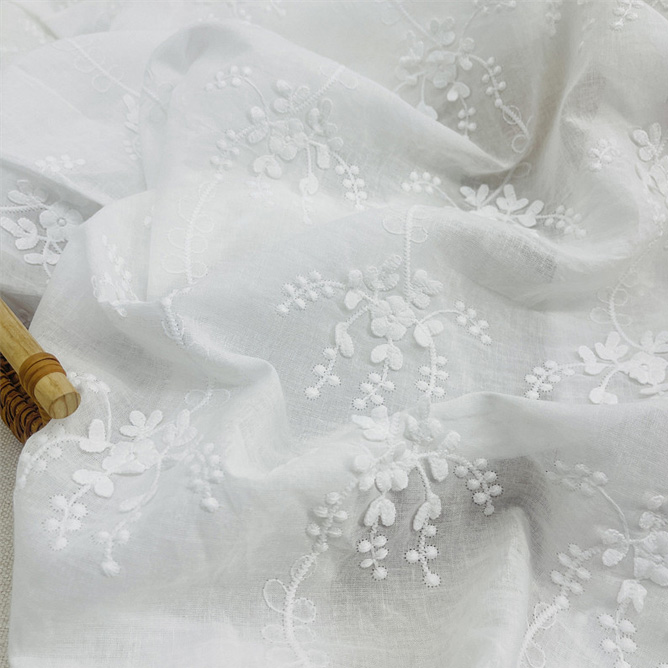 Cotton lace fabric with textured 3D embroidery details